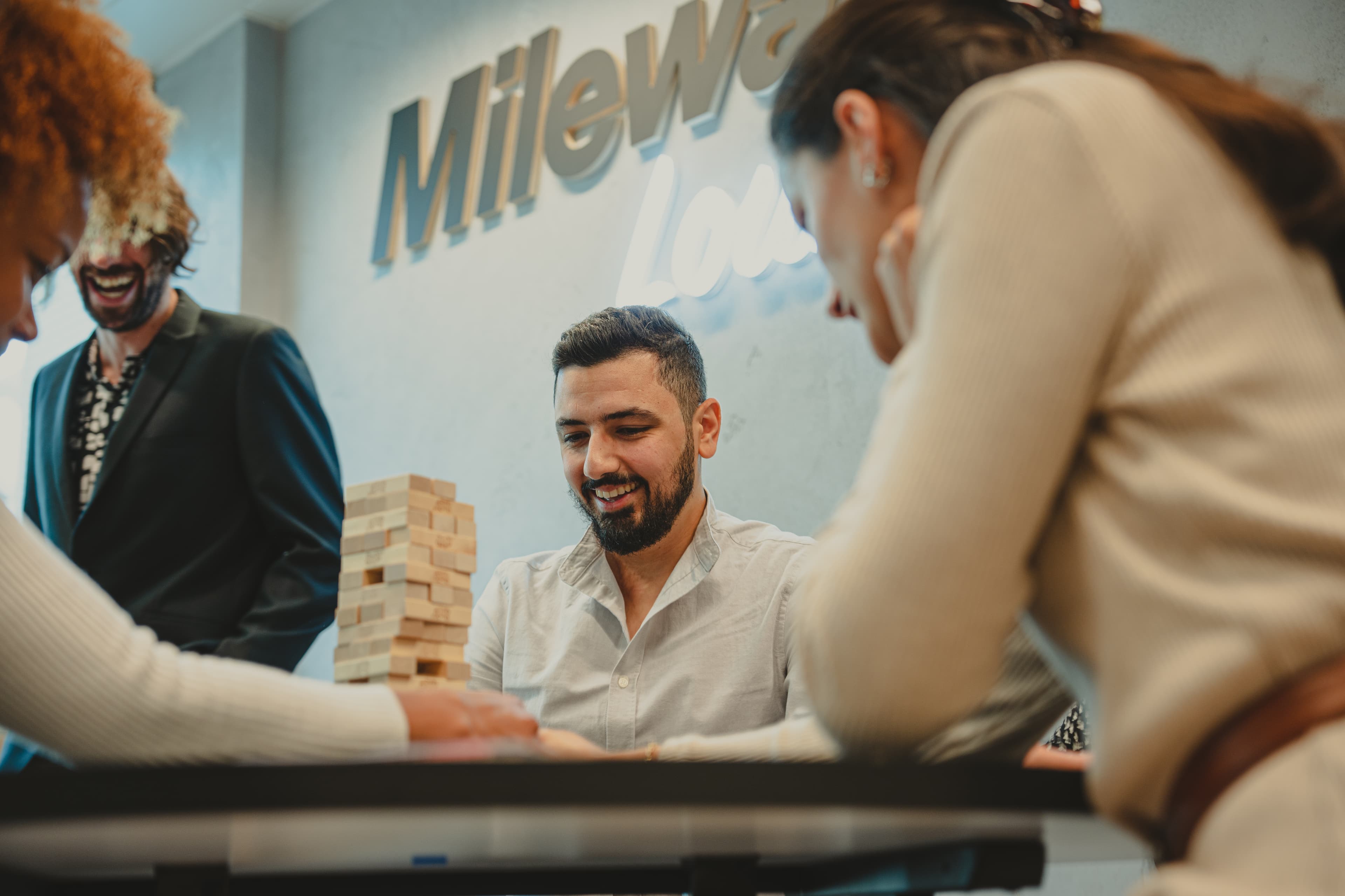 Mileway employees playing jenga