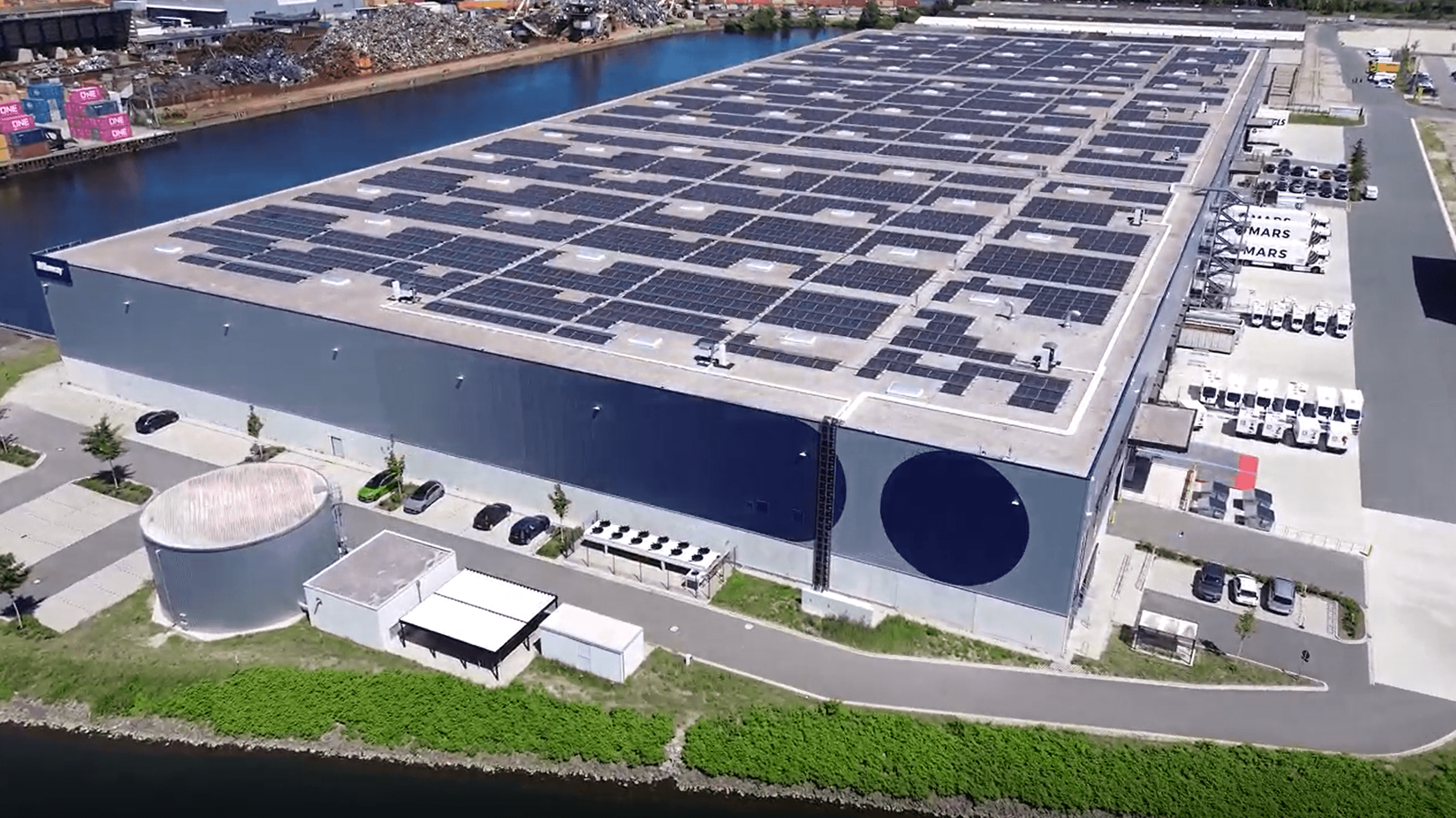 A large building with solar panels.